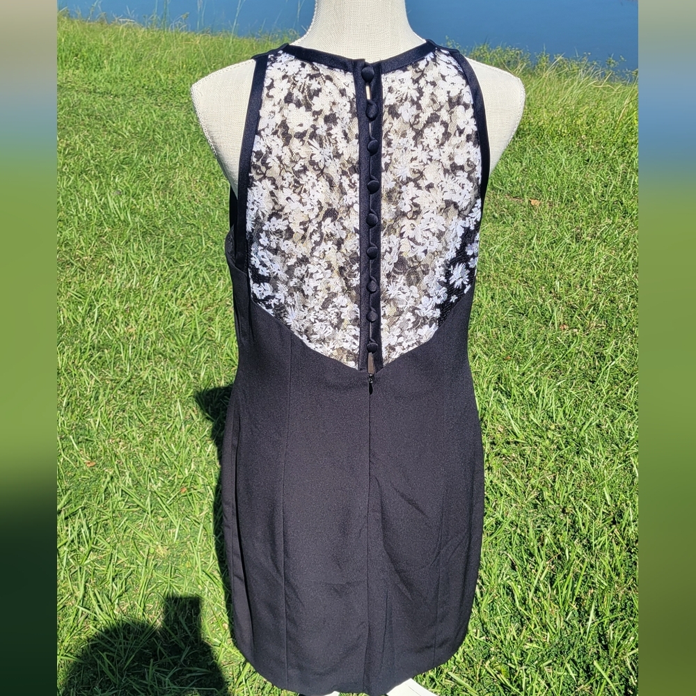 Black sleeveless dress by Donna Ricco